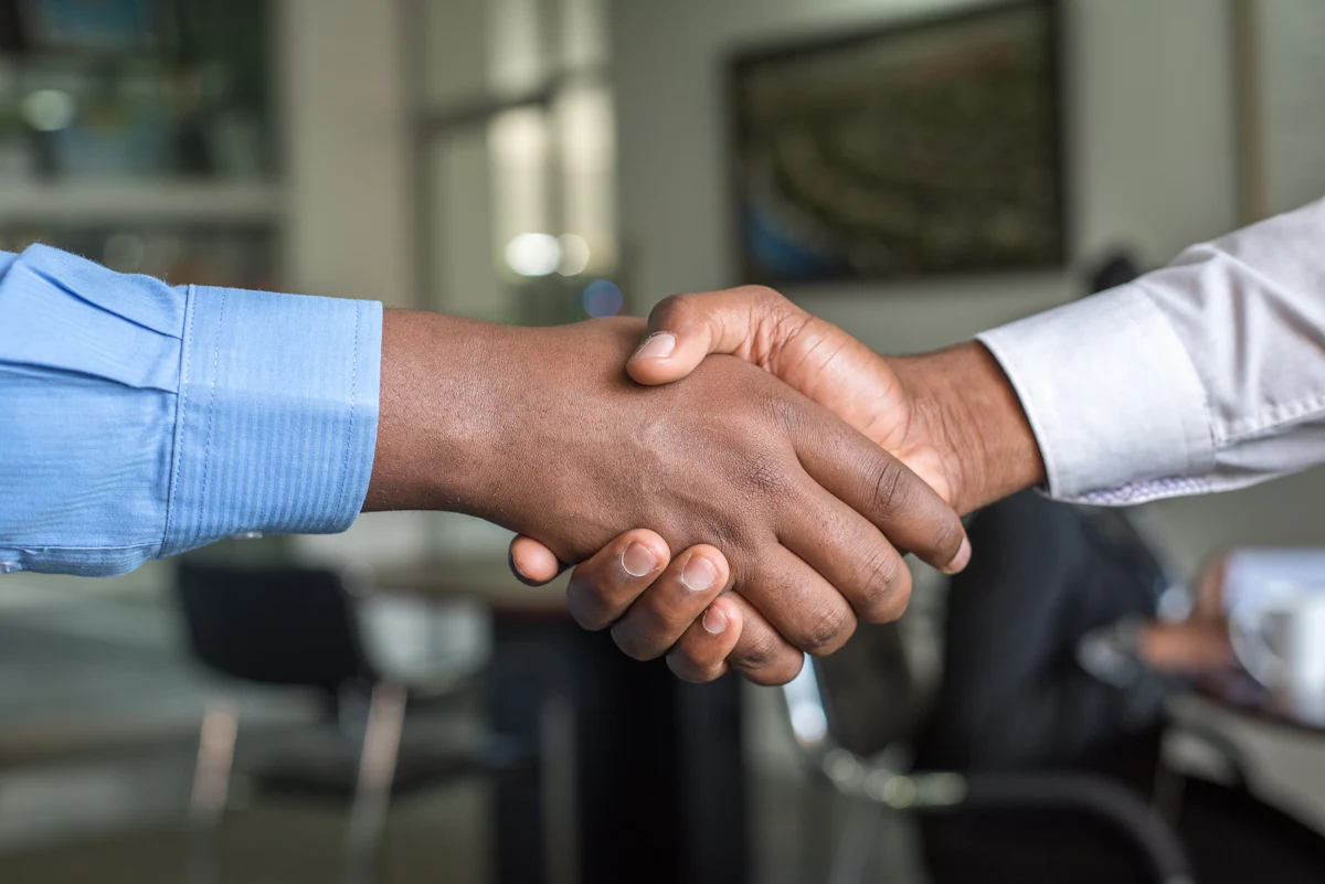A professional shaking hands with a client